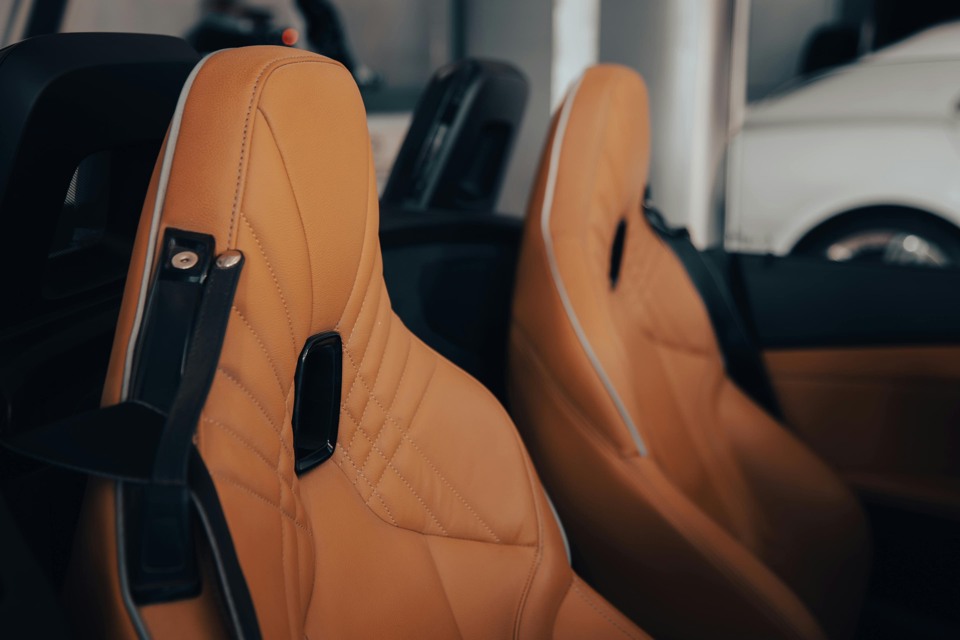 Custom upholstery photographed inside a vehicle cabin.